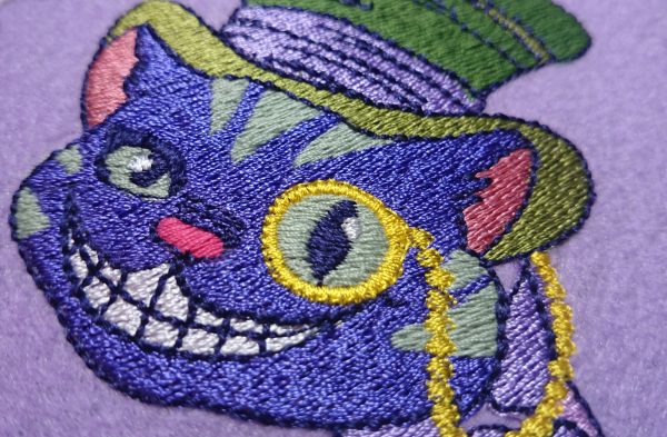 Machine Embroidery Design Cheshire cat in Top Hat and monocle Machine Embroidery Design Cheshire cat in Top Hat and monocle